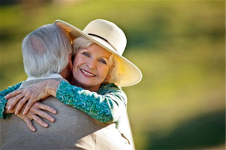 senior couple eye contact head and shoulders not indoors - Senior couple sharing a hug. Stock Photo - Premium Royalty-Free, Code: 6128-08747779