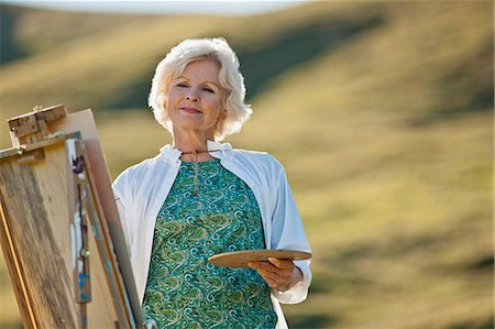 paint palette - Mature woman painting on a scenic hillside. Stock Photo - Premium Royalty-Free, Code: 6128-08747783