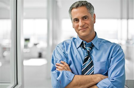 simsearch:6128-08747789,k - Businessman in his office. Stock Photo - Premium Royalty-Free, Code: 6128-08747790