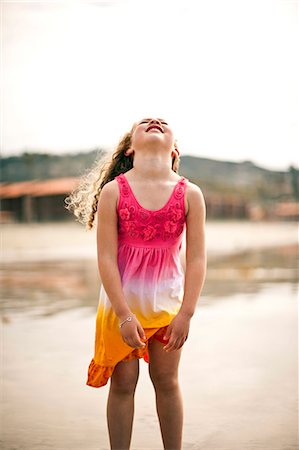 simsearch:6128-08747842,k - Young girl playing at the beach. Stockbilder - Premium RF Lizenzfrei, Bildnummer: 6128-08747857