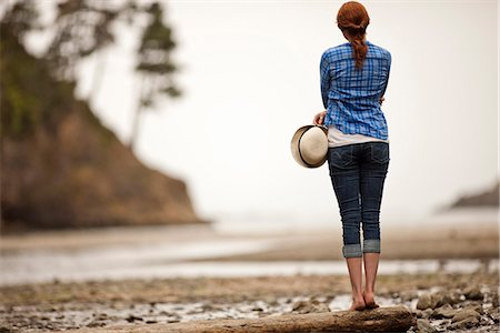 Teenage girl watching the beach. Stock Photo - Premium Royalty-Free, Code: 6128-08748140