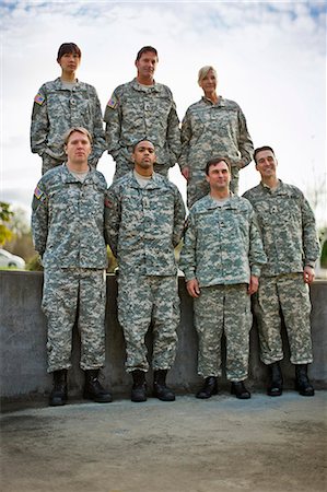 simsearch:6128-08737914,k - Portrait of a group of US Army soldiers posing for a photograph. Stock Photo - Premium Royalty-Free, Code: 6128-08766708