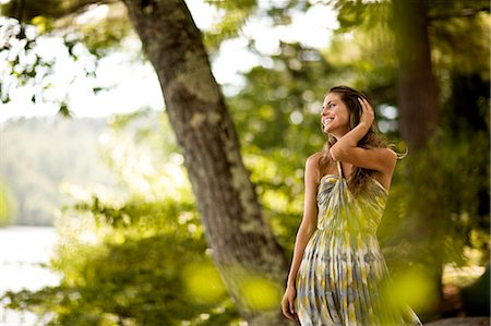 dress woman walk forest - Portrait of woman in green dress in the woods. Stock Photo - Premium Royalty-Free, Code: 6128-08767075