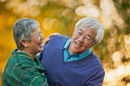 simsearch:600-03738693,k - Happy senior couple playfully dancing together. Fotografie stock - Premium Royalty-Free, Codice: 6128-08767209
