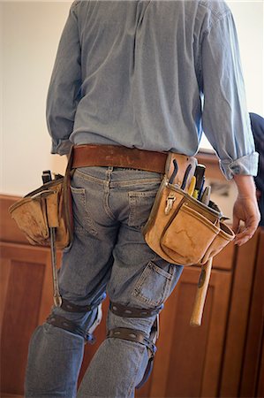 diy tools - Tool belt worn by a male builder. Photographie de stock - Premium Libres de Droits, Code: 6128-08780370