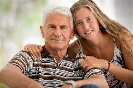 simsearch:400-06517383,k - Portrait of senior man with his teenage granddaughter. Fotografie stock - Premium Royalty-Free, Codice: 6128-08780667