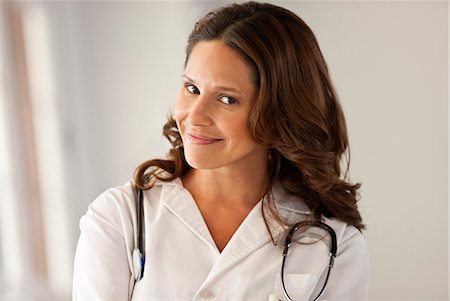 strong depth of field - Portrait of female doctor. Stock Photo - Premium Royalty-Free, Code: 6128-08780757