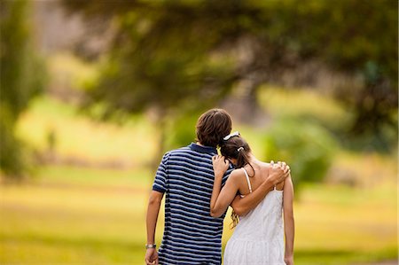 simsearch:614-06402621,k - Teenage boy hugging his girlfriend. Stock Photo - Premium Royalty-Free, Code: 6128-08780819