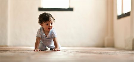 person on all four - Toddler boy crawling. Stock Photo - Premium Royalty-Free, Code: 6128-08780821