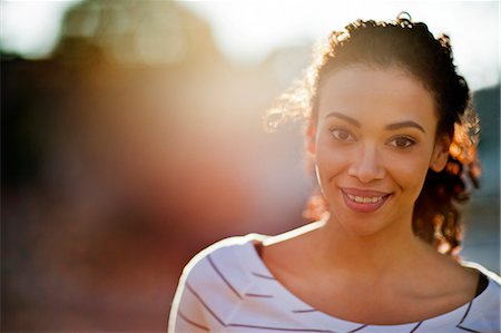 simsearch:6128-08728169,k - Portrait of happy mid-adult woman. Stock Photo - Premium Royalty-Free, Code: 6128-08781057