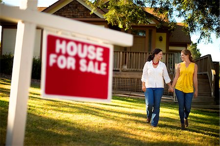 friends, 40, outside - Couple making a toast with their real estate agent. Stock Photo - Premium Royalty-Free, Code: 6128-08727973