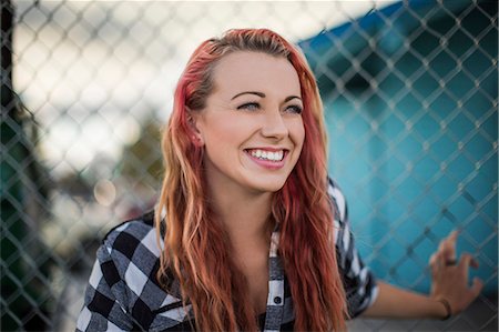 simsearch:6128-08727668,k - Woman with red hair smiling Stock Photo - Premium Royalty-Free, Code: 6128-08728148