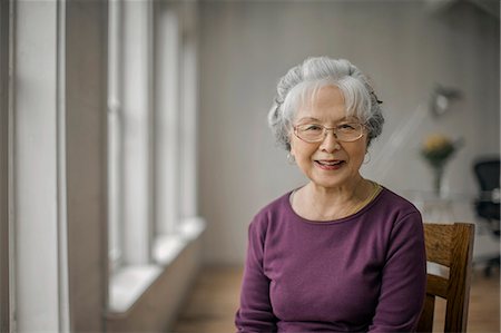 picture in old person house - Portrait of a smiling senior woman. Stock Photo - Premium Royalty-Free, Code: 6128-08728197