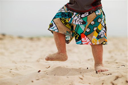 simsearch:6128-08747842,k - Young boy walking on a beach. Stockbilder - Premium RF Lizenzfrei, Bildnummer: 6128-08737997