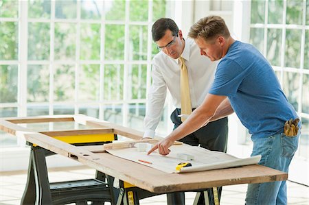 simsearch:6128-08747789,k - Businessman and contractor working together on a project. Stock Photo - Premium Royalty-Free, Code: 6128-08738104