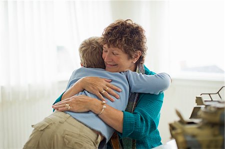 simsearch:632-03779299,k - Mature woman hugging her grandson. Foto de stock - Sin royalties Premium, Código: 6128-08738210