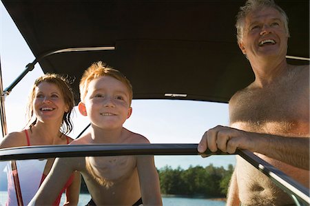 Young boy and his mature grandparents on a boat. Photographie de stock - Premium Libres de Droits, Code: 6128-08825402