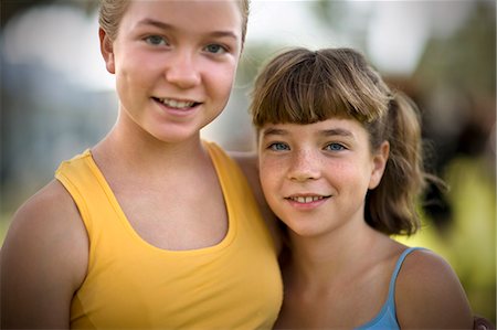 palmetto - Portrait of two smiling young girls. Stock Photo - Premium Royalty-Free, Code: 6128-08825425