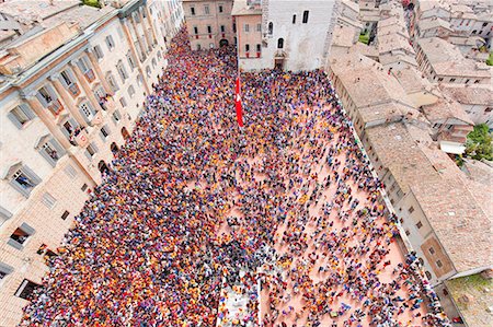 Europe,Italy,Umbria,Perugia district,Gubbio. The crowd and the Race of the Candles Stock Photo - Premium Royalty-Free, Code: 6129-09044076