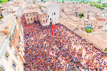 Europe,Italy,Umbria,Perugia district,Gubbio. The crowd and the Race of the Candles Stock Photo - Premium Royalty-Free, Code: 6129-09044079