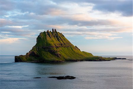 faroe islands - Vagar island, Faroe Islands, Denmark. Tinholmur islet at sunset. Stock Photo - Premium Royalty-Free, Code: 6129-09044510