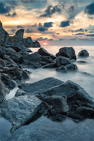 simsearch:6129-09057605,k - Zambrone, province of Vibo Valentia, Calabria, Italy, Europe. Sunset on the beach of Lion's rock Photographie de stock - Premium Libres de Droits, Code: 6129-09044675