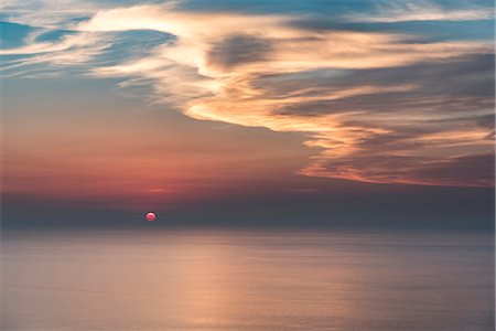 Zambrone, province of Vibo Valentia, Calabria, Italy, Europe. Sunset in Zambrone with a view of the Stromboli volcano Foto de stock - Sin royalties Premium, Código: 6129-09044678