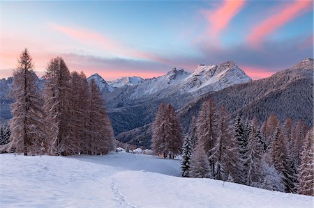 Europe, Italy, Veneto, Belluno, Dolomites. Colorful sunrise over the village of Coi, Zoldo valley. Stock Photo - Premium Royalty-Free, Code: 6129-09044613