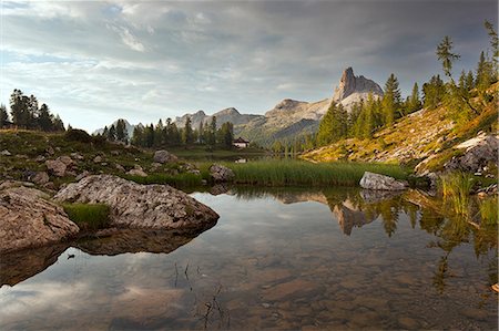 Dawn at Federa Lake with Becco di Mezzodì, Croda da Lago, Dolomites, Cortina d'Ampezzo, Veneto, Italy Stock Photo - Premium Royalty-Free, Code: 6129-09057621