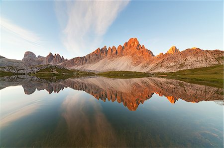 reflection of mountains - Dawn at Piani Lakes with Paterno Mount, Dolomites, Innichen, South Tyrol, Italy Stock Photo - Premium Royalty-Free, Code: 6129-09057624