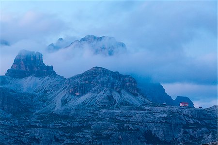 Locatelli refuge near the Three Peaks of Lavaredo after the sunset, Trentino Alto-Adige, Italy. Stock Photo - Premium Royalty-Free, Code: 6129-09057803