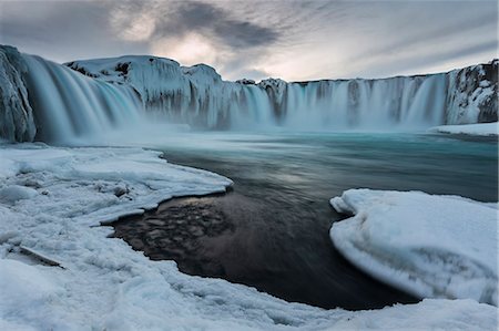 pictures of winter in europe - Gullfoss waterfall in norther Iceland near Akureyri after the sunset, during the blue hour in a cold winter evening. Stock Photo - Premium Royalty-Free, Code: 6129-09057984