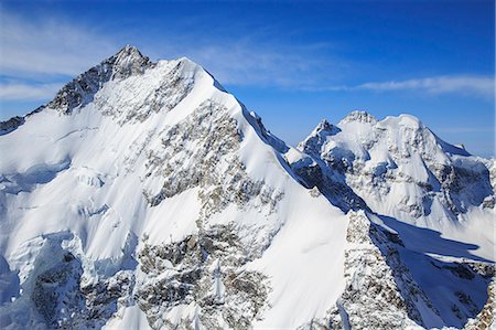 Aerial view of Pizzo Bernina and of Piz Roseg. Engadine, Canton of Grisons, Switzerland Europe Photographie de stock - Premium Libres de Droits, Code: 6129-09058120