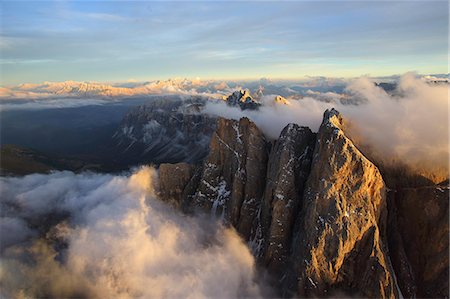 simsearch:6129-09057737,k - Aerial view of the mountain range of Odle surrounded by clouds. Dolomites Val Funes Trentino Alto Adige South Tyrol Italy Europe Stock Photo - Premium Royalty-Free, Code: 6129-09058137