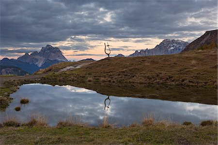 reflection in puddle - Laste Alm, Dolomites, Rocca Pietore, Belluno province, Veneto, Italy. Stock Photo - Premium Royalty-Free, Code: 6129-09086731