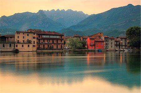 sunrise in the alps - Sunrise on the mount Resegone and Pescarenico, Pescarenico, Lecco province, Lombardy, Italy, Europe. Stock Photo - Premium Royalty-Free, Code: 6129-09086737