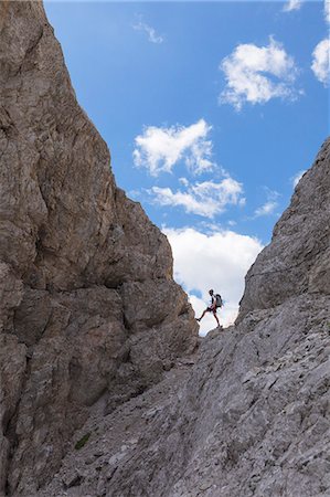 sexten dolomites - Climber on the via ferrata Roghel, Popera group, Sexten Dolomites, Comelico Superiore, Belluno, Veneto, Italy Photographie de stock - Premium Libres de Droits, Code: 6129-09086873