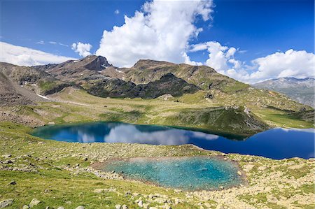 Blue water of alpine lake, Leg Grevasalvas, Julierpass, Maloja, canton of Graubünden, Engadin, Switzerland Photographie de stock - Premium Libres de Droits, Code: 6129-09086988
