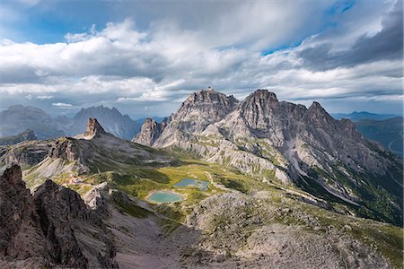 simsearch:6129-09086915,k - Sesto / Sexten, province of Bolzano, Dolomites, South Tyrol, Italy. Zhe sunrays after the thunderstorm illuminate the lakes Piani Stock Photo - Premium Royalty-Free, Code: 6129-09086919