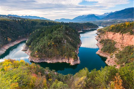 red rocks - Island of Santa Giustina lake Europe, Italy, Trentino Alto Adige, Trento, Cles, Non valley Photographie de stock - Premium Libres de Droits, Code: 6129-09087022