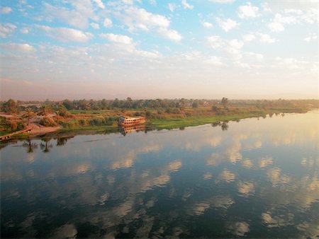 Reflection of cloud on water, Nile River, Egypt Stock Photo - Premium Royalty-Free, Code: 625-00804720