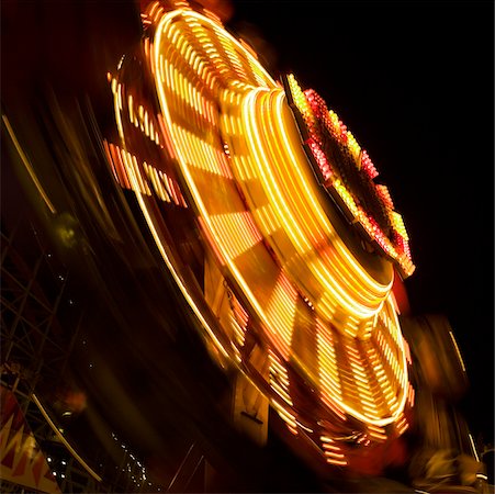 simsearch:625-00806318,k - Ride in an amusement park at night, San Diego, California, USA Fotografie stock - Premium Royalty-Free, Codice: 625-00804783