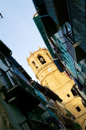 simsearch:625-00806178,k - Low angle view of a tower between two buildings, Spain Stock Photo - Premium Royalty-Free, Code: 625-00804909