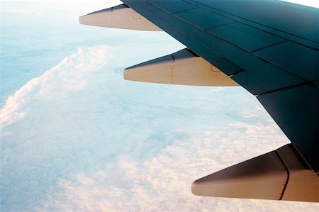 simsearch:625-00805855,k - Close-up of an airplane wing in flight Stock Photo - Premium Royalty-Free, Code: 625-00805023