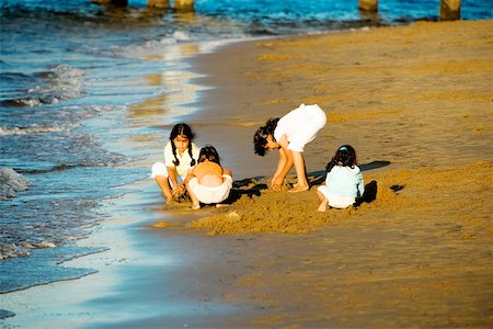 High angle view of children playing on the beach, San Diego, California, USA Stock Photo - Premium Royalty-Free, Code: 625-00805057