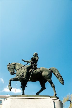 Low angle view of the statue of a person on a horse, New York City, New York State, USA Stock Photo - Premium Royalty-Free, Code: 625-00805120