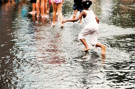 Group of children playing in water Stock Photo - Premium Royalty-Free, Code: 625-00805136