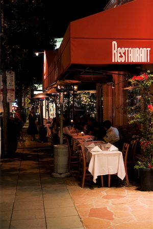 dark restaurant - Tables and chairs set up at an outdoor cafe, Los Angeles, California, USA Stock Photo - Premium Royalty-Free, Code: 625-00805224