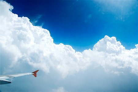 simsearch:625-00805855,k - Tip of the wing of an airplane in flight Stock Photo - Premium Royalty-Free, Code: 625-00805337