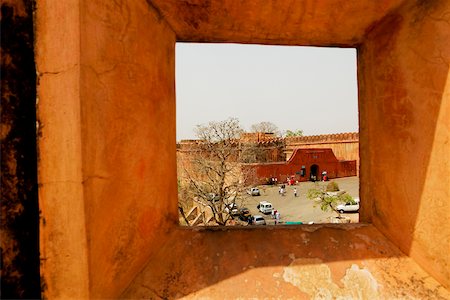street photography in rajasthan - High angle view of a street viewed from a window of a fort, Jaigarh Fort, Jaipur, Rajasthan, India Stock Photo - Premium Royalty-Free, Code: 625-00805391